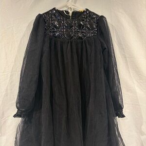 Chic Black Dress with Gold Accents